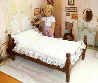 Wooden doll bed