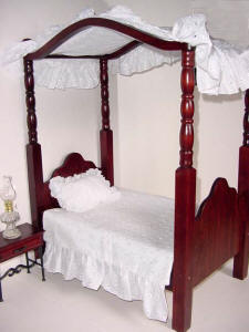 Wooden doll-size canopy bed