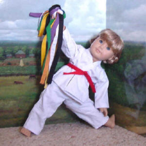 18 inch doll wearing a martial arts set