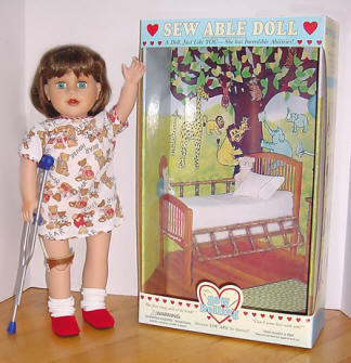 special needs doll with box background